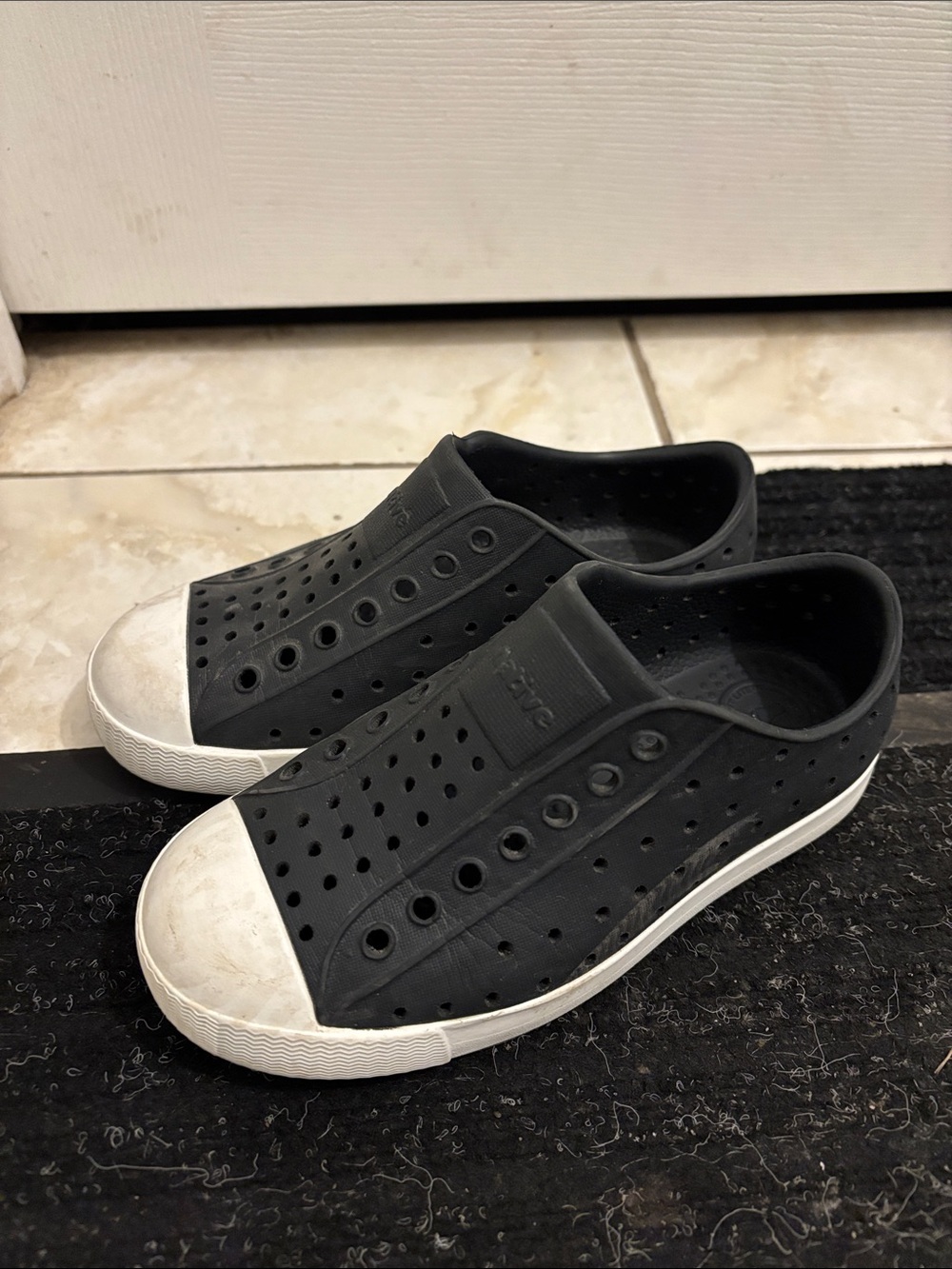 Native kids Black Slip-On Perforated Sneakers with White Toe